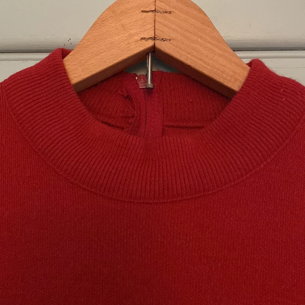 Classic used red sweater by Haymaker with zipper in the back size 42